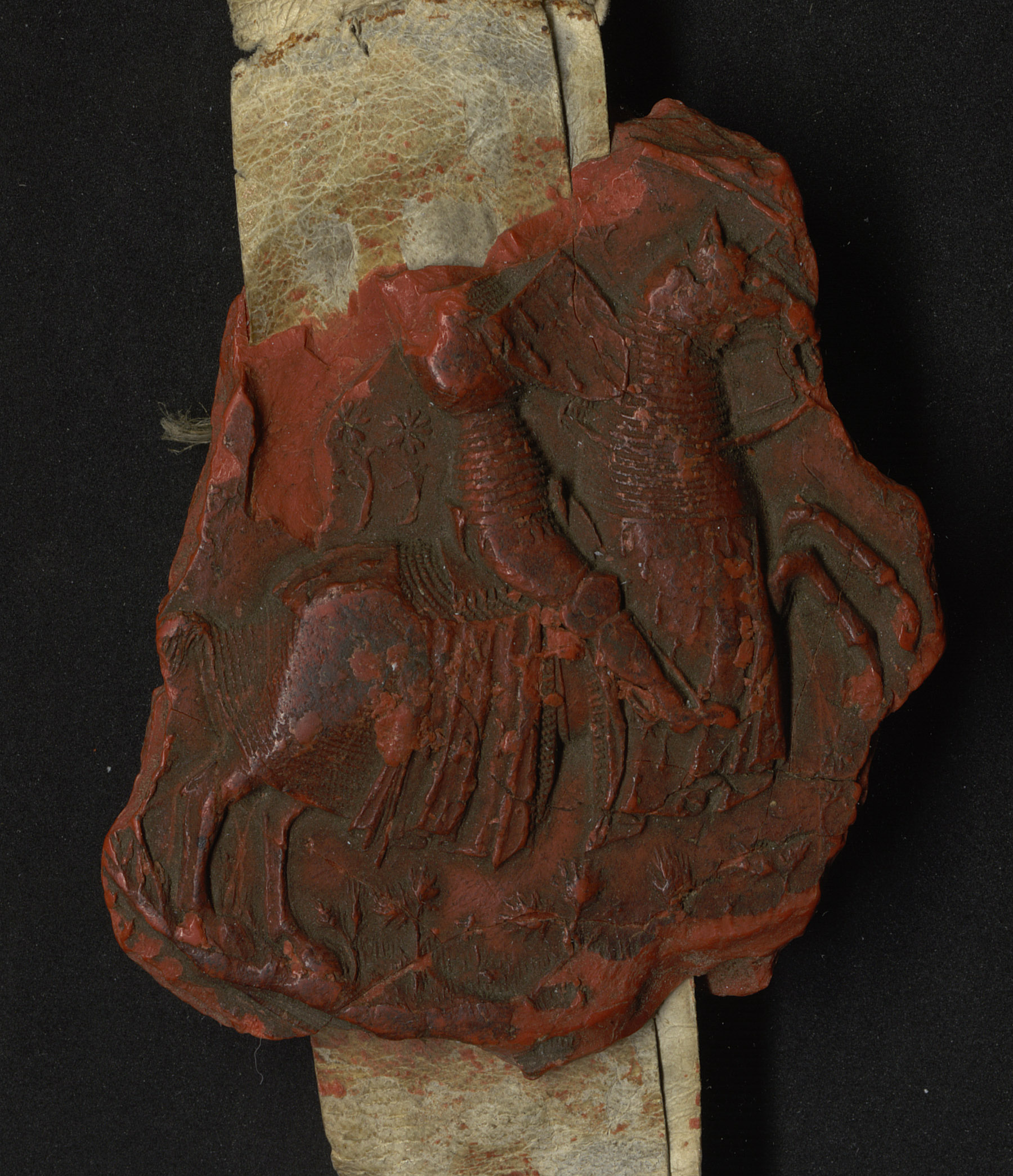 Sur ce sceau en cire lié aux lettres patentes du duc Jean V, datées du 2 décembre 1407, un cheval monté par un cavalier en armure semble se cabrer (AA2/3)